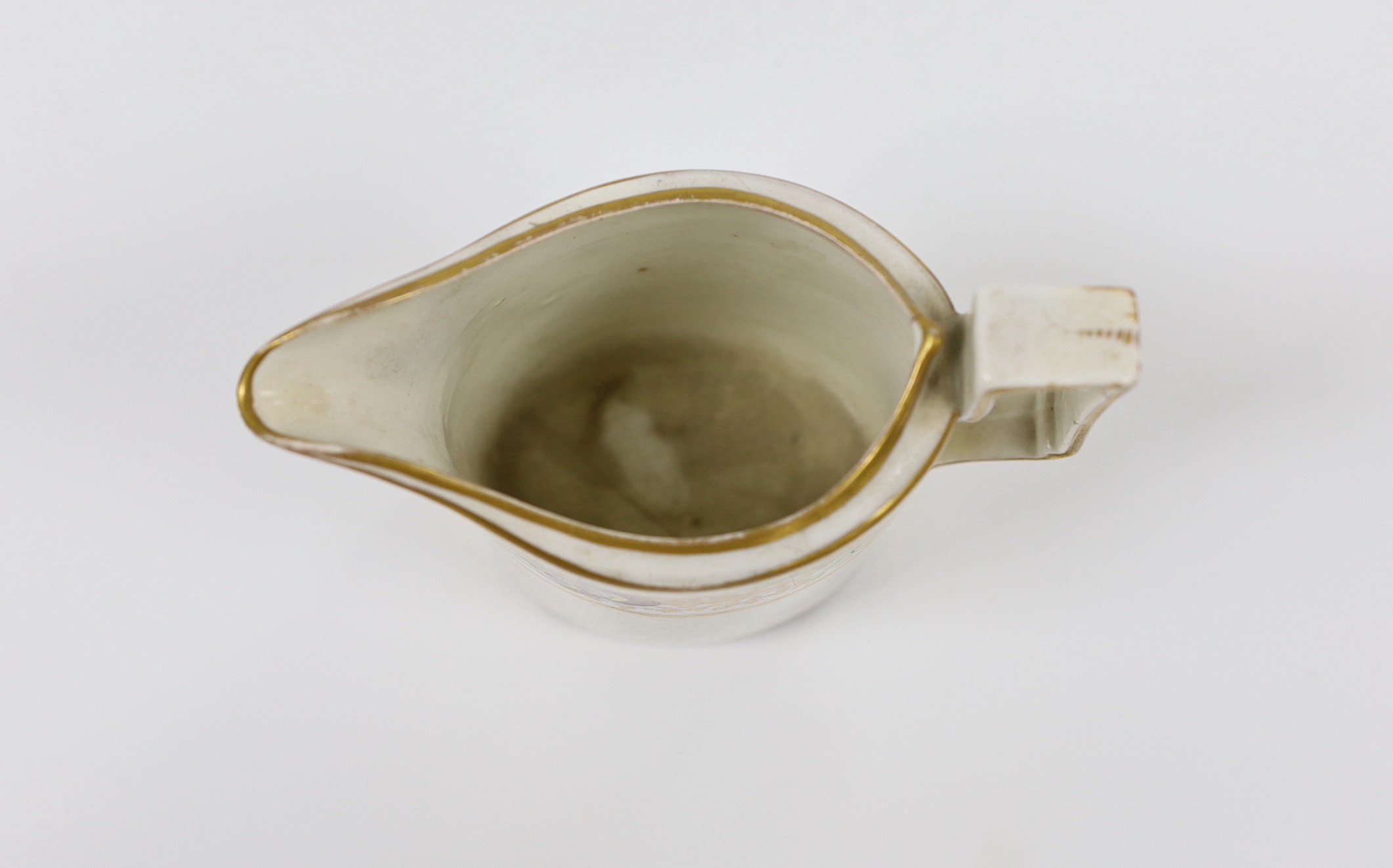 An 18th century rare Pinxton oval milk jug, cracked